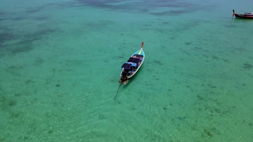 Explore the Crystal Clear Waters of Koh Kradan Thailand with Serene Boat Journeys