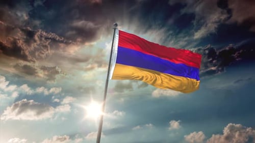 Armenian Flag Waving Against a Dramatic Cloudy Sky