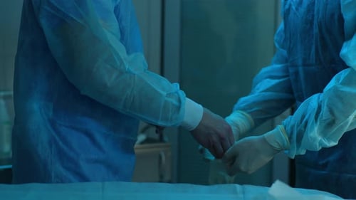 Healthcare Workers Preparing for a Surgery