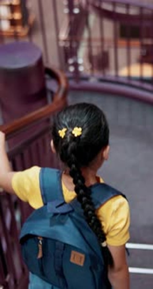 Education, stairs and walking with girl in library for child development, growth or learning