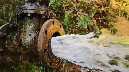 Highpressure Fluid Erupts Suddenly Corroded Pipe Releasing Water Under Intense High Pressure