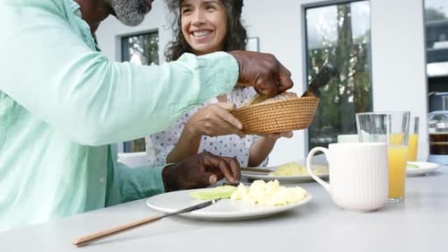 Couple Enjoys Breakfast at Home