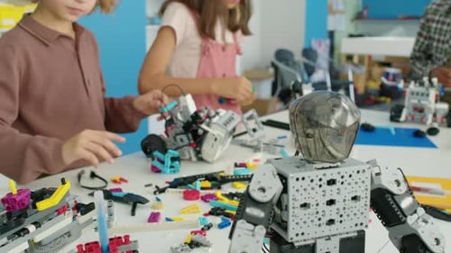 Diverse Kids Making Models from Building Blocks at Robotics Club