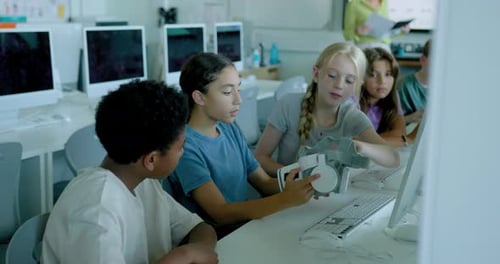 School Children in STEM Computer Classroom using Virtual Reality Headset