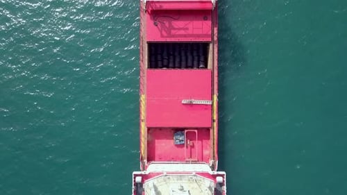 Cargo Ship at sea,Top down drone footage