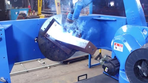 Robotic Welding At Industrial Fabrication Building. - close up