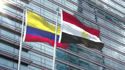 Waving Flags of Colombia and Egypt on Modern Building Background