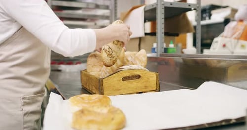 4k video footage of an unrecognizable baker working in a bakery