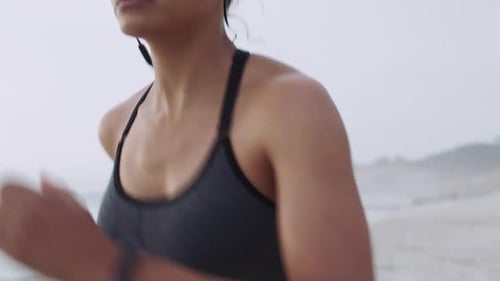 Fitness, woman and running on the beach for exercise, cardio workout or intense training