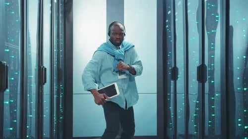 Man Dancing in Futuristic Server Room