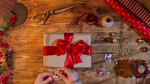 Gift Wrapping Overhead Shot on Wooden Surface