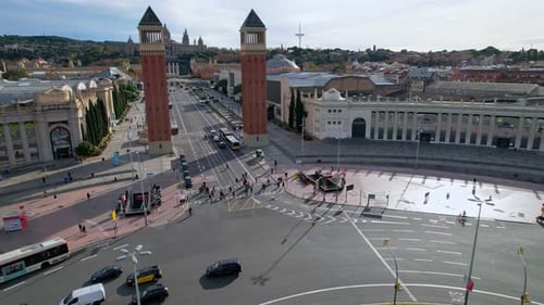 Aerial view of city traffic Plaza de Espana of Squares in Barcelona with Venetian Towers