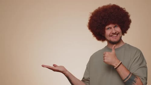 Man Pointing Empty Place Advertising Area for Commercial Text Copy Space for Goods Promotion