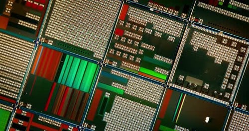 Silicon semiconductor wafer with integrated circuit die mosaic pattern.