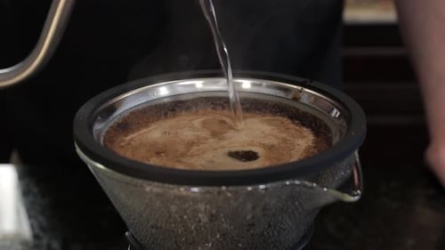 Pour Over Coffee Brewing Process in Kitchen