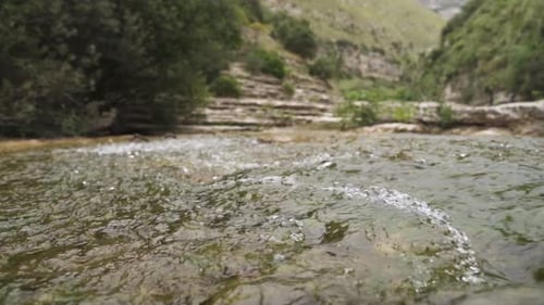 River stream flows in slow motion in Nature Reserve Cavagrande, Sicily