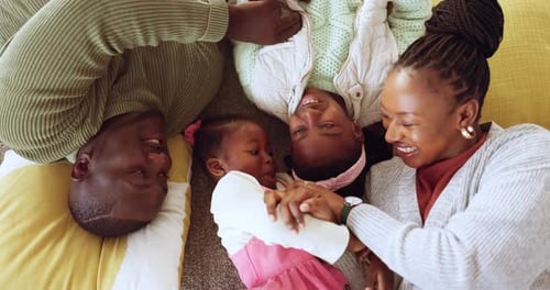 Floor, above and black family playing in a living room or lounge happy, love