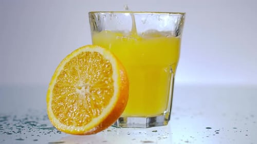 Fresh Orange Juice and Slice in Glass