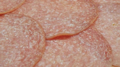 Sliced Raw Smoked Salami Sausage Spun As a Restaurant Backdrop Fresh Cured Sausage for a Sandwich