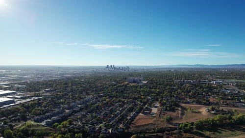 Drone aerial view of the suburbs outside of Denver, CO on a sunny day