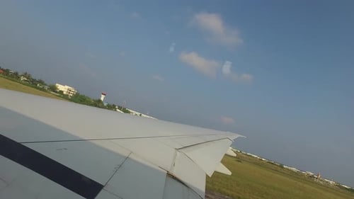 Airplane wing accelerating on airport runway transportation concept