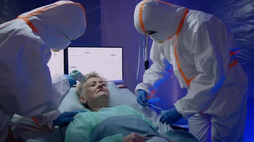 Doctors and Infected Patient in Hospital, Coronavirus Concept