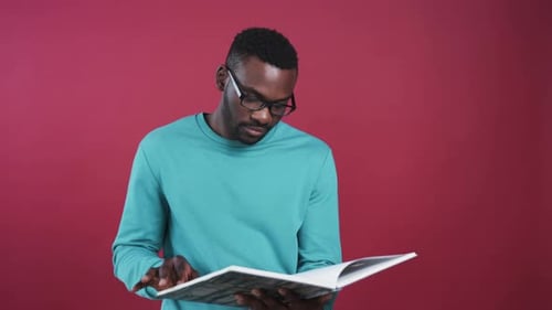 Young Adult Reading a Book