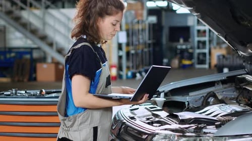 Engineer Orders New Car Parts in Garage
