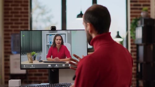 Young Businessman Talking to Manager on Remote Teleconference