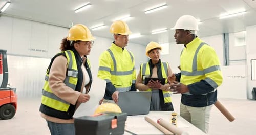 Construction Team Meeting to Discuss Project Plans