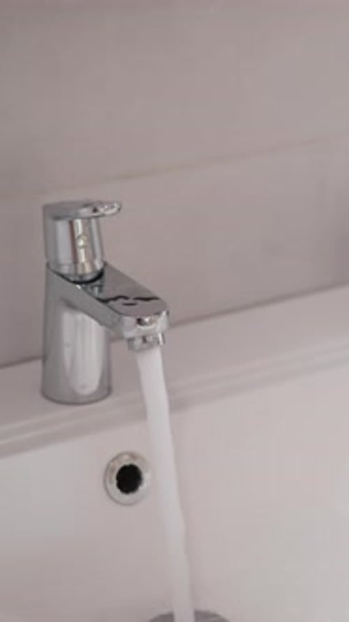 Running Faucet Turns Off in Bathroom Sink