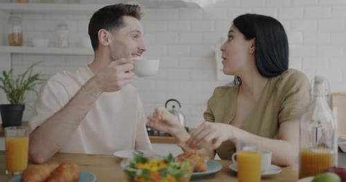 Couple Enjoys Breakfast Together at Home