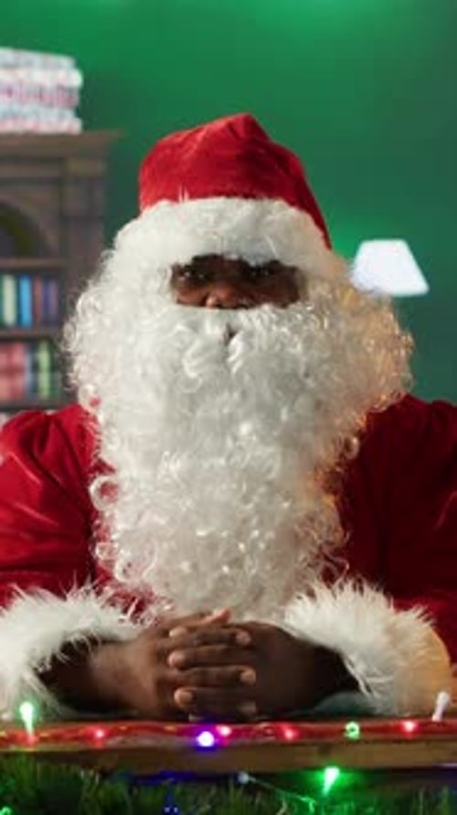 Vertical Video POV of African American Santa Waving and Chatting with People