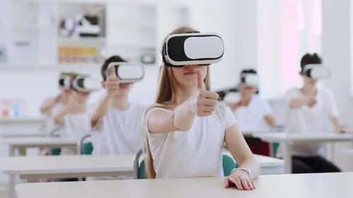 Students using VR headsets in classroom for education