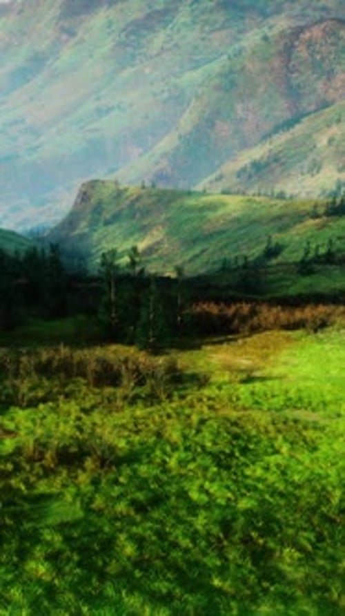 Serene Green Valley Encircled By Majestic Mountains