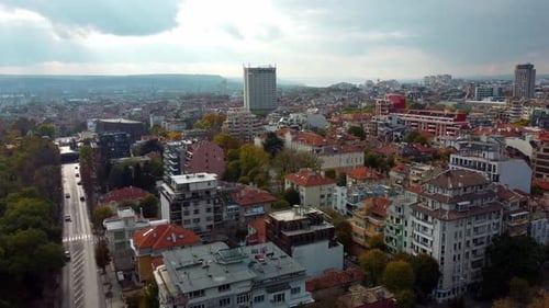 Aerial Panoramic View of an Urban Cityscape with Red Rooftops