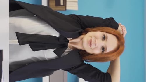 Vertical Video of Exercises that can be done in the office. Stretching and arm exercises.