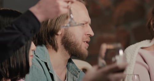 Friends Together Toasting Wine at Birthday Party