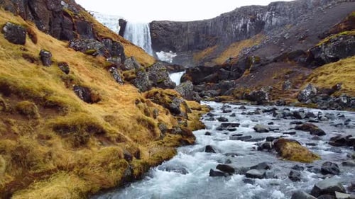 Scenic Waterfall in Iceland Pure Glacier River In Icelandic Mountains Autumn Colours Epic Aerial