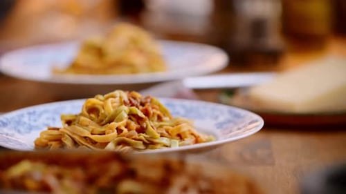 Close Up of Appetizing Pasta Dishes on Table