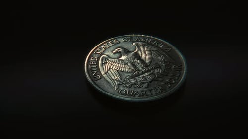 Spinning US Quarter Coin Landing On Tails