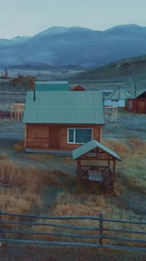 Scenic Rural Setting with Wooden Cabins