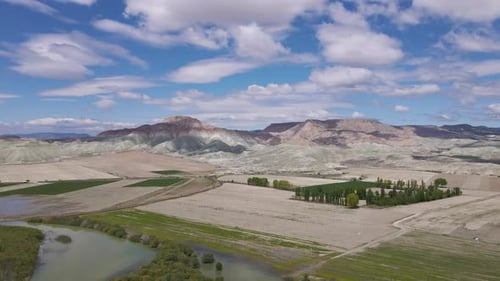 Aerial View of Rural Landscape with Distant Mountains