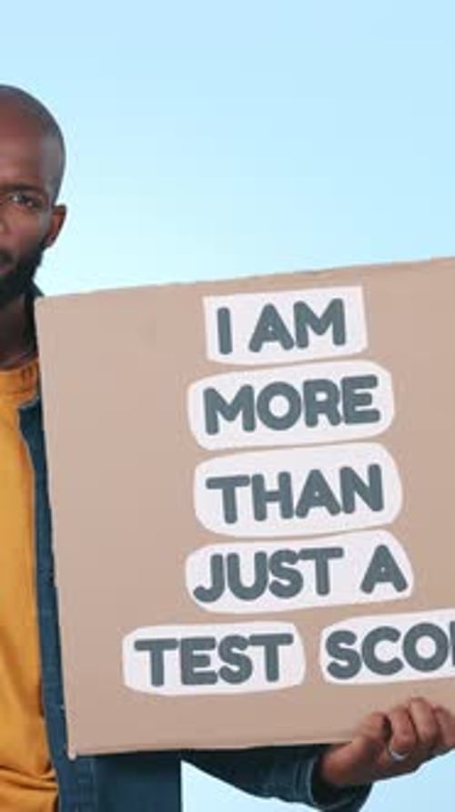 Education, protest and poster with face of black man in studio for rally, university and learning