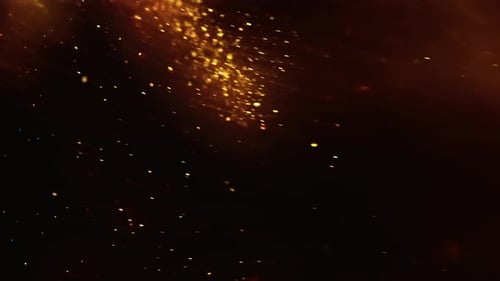 Gold Dust Particles Fly in Slow Motion