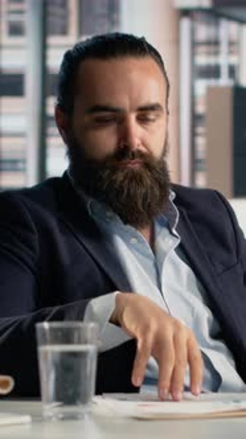 Vertical Video Tablet Businessman Analyzing KPIs Data Metrics and Insights Management