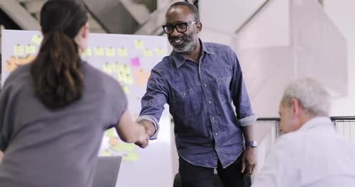 African American businessman shaking hands at the end of a meeting