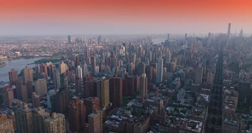 Impressive New York cityscape at sunrise. Beautiful quarters and streets of a metropolis.