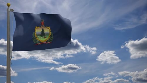 Waving Vermont State Flag Against Blue Sky
