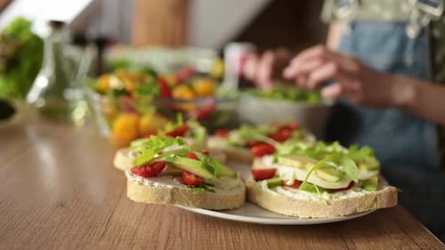 Preparing Fresh Open Faced Sandwiches in Home Kitchen